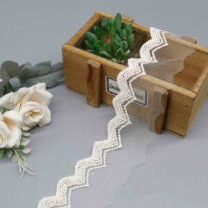 Front-facing shot of Chevron Wave Polyester Mesh Embroidery Lace Trim, showing zigzag pattern and sheer tulle ground clearly.
