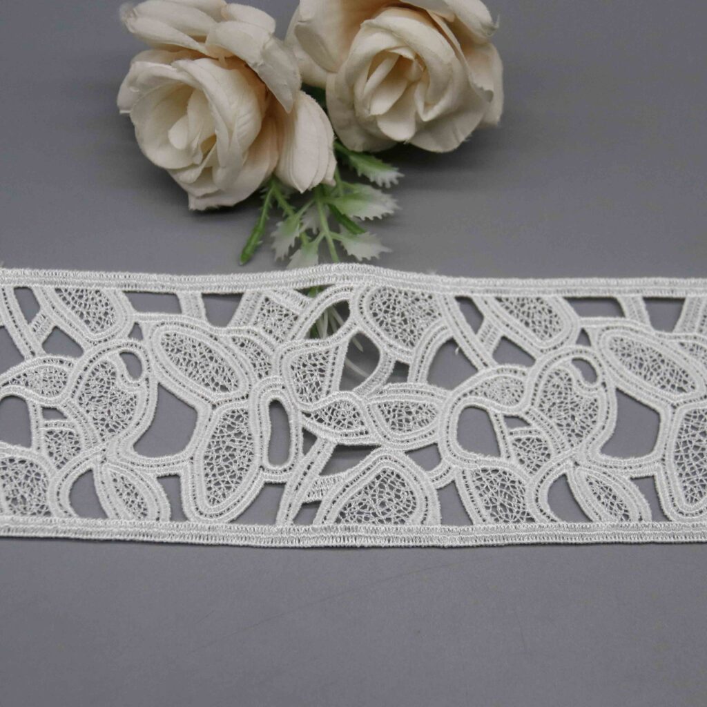 Macro close-up capturing intricate mesh-filled centers and artistic embroidery craftsmanship