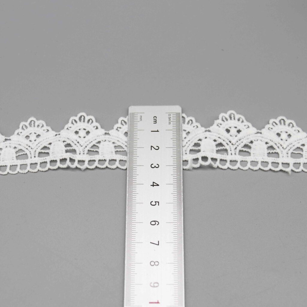 Horizontal ruler placement illustrating spacing and scale of fan motif design cycle