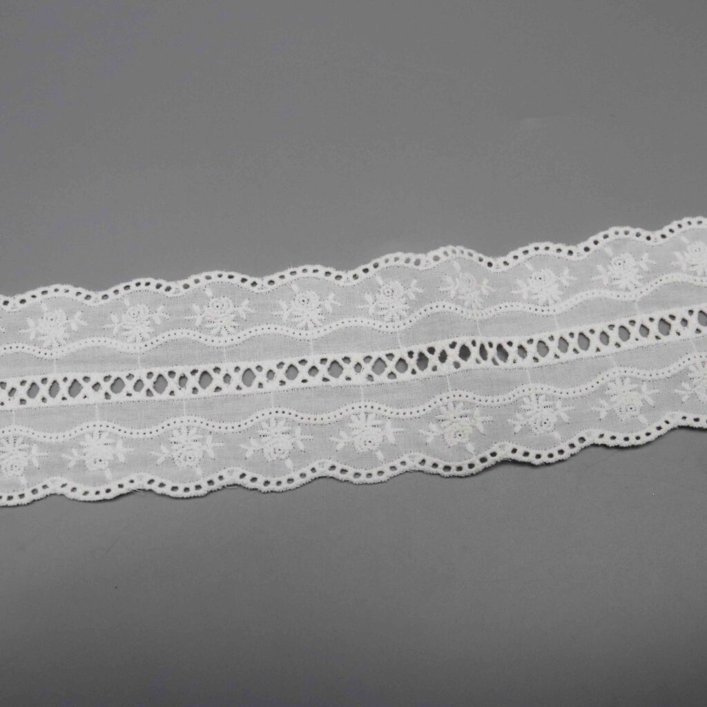 Angled view highlighting lightweight sheer finish and crisp tactile sensation of pure cotton textile