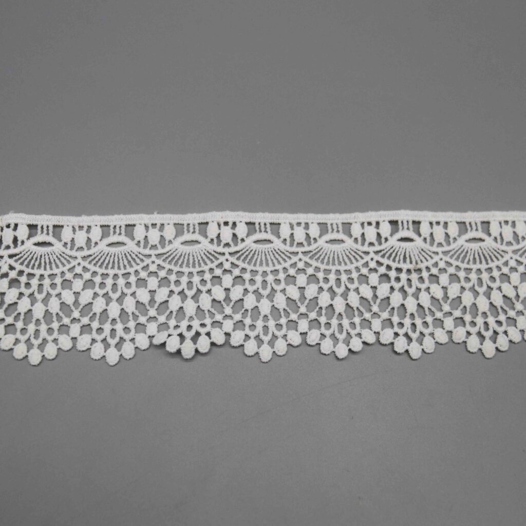 Backlit view revealing the fabric’s airy lattice and light transmission