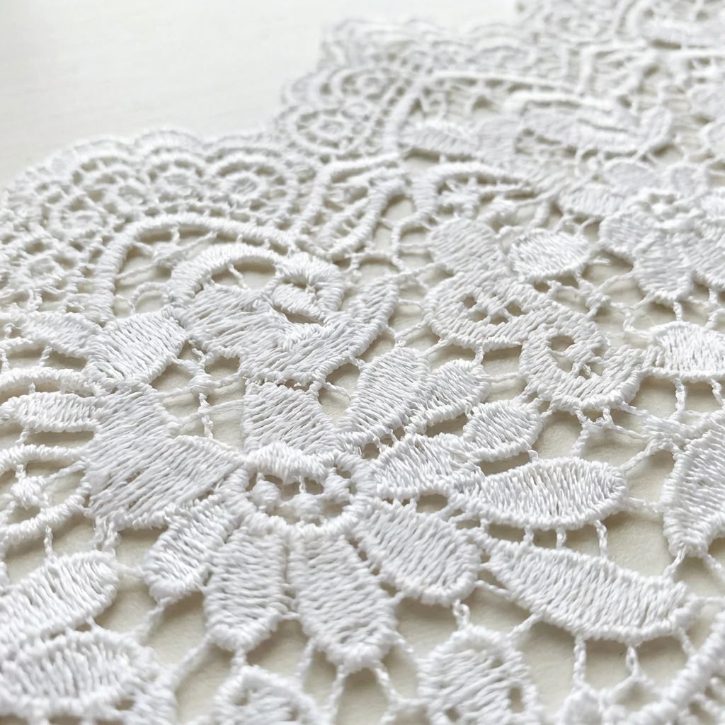 Polyester lace fabric close-up showing crisp pattern definition