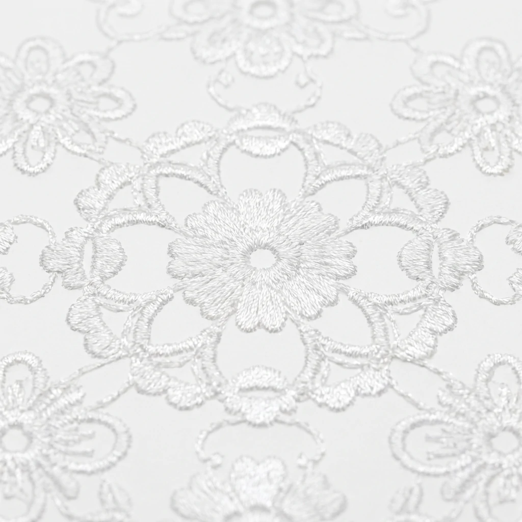 White polyester embroidery lace showing smooth uniform finish