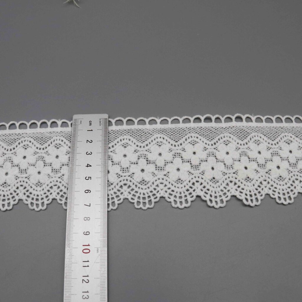 Vertical sizing gauge displaying exact 7.5cm dimension of decorative ribbon