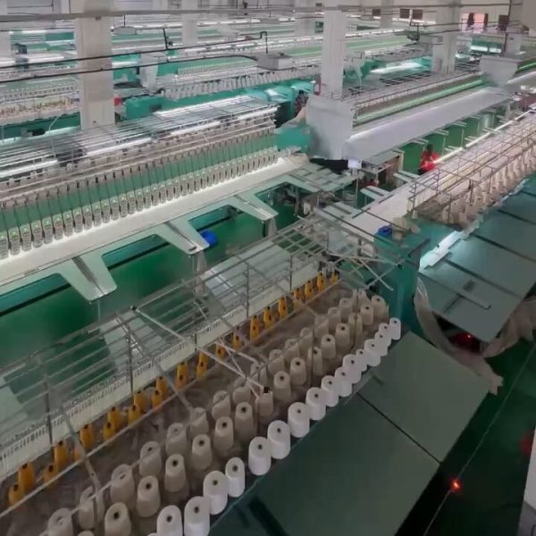 State-of-the-art water soluble lace factory equipped with advanced technology and skilled workers, specializing in custom lace design and bulk production.