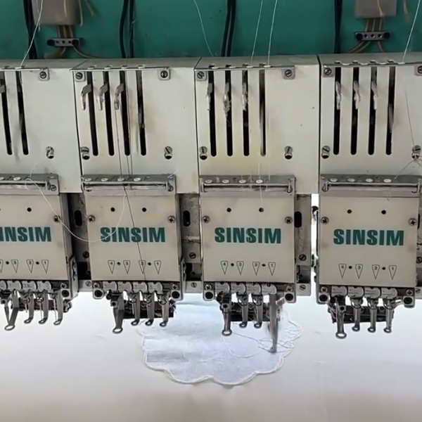 State-of-the-art manufacturing plant specializing in water soluble lace production with customized design services and bulk order capability.