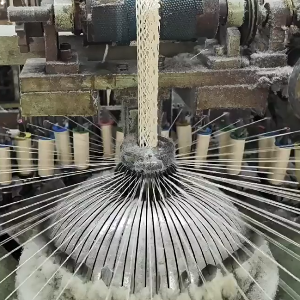 View of a large-scale cotton lace production facility combining skilled craftsmanship and advanced manufacturing equipment for bulk lace orders.